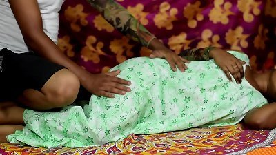 A beautiful wife seduces her husband in a room.