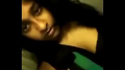 A girl is making a sexy selfie and showing it to the camera