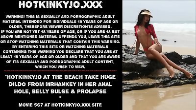 Hotkinkyjo at the beach take big fake penis from mrhankey in her anal hole, tummy full salute & rosebud