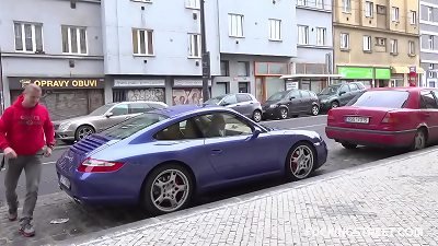A blonde woman is invited to a private photoshoot