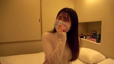 A Japanese college girl enjoys watching men orgasm and shares her experiences in an amateur home video