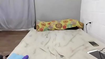 A plus sized Hispanic woman masturbates and her husband assists her.