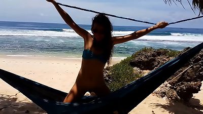 Beach scene with body paint and butt plug, flashing on the ocean