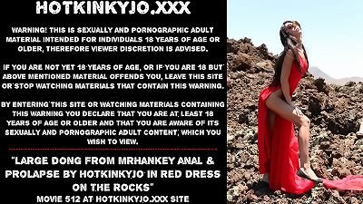 giant dong from mrHankey anal & ass inside-out by Hotkinkyjo in red sundress on the rocks