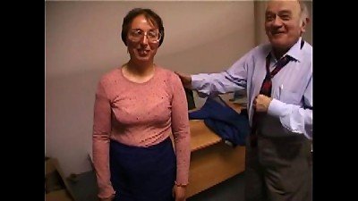 A mature man having sex with his wife and ejaculating on her face