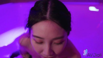Chinese brunette Li Er gets fucked in the bathroom