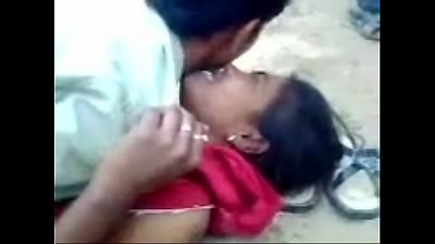 A couple is having fun outdoors with a hot Tamil chick