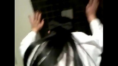 Akhil plumbing Meenal in the washroom of a motel after a fortunate customer meet