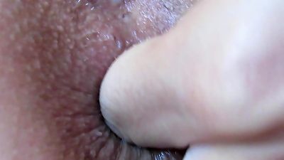 Intense up-close anal stimulation and fingering of the anus