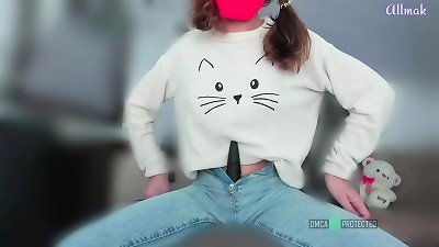 A thin teenage girl uses a vibrator on a pillow and ejaculates in a cowgirl position