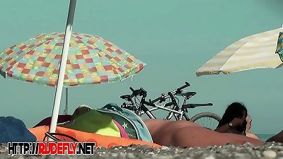 lady nudists take off their clothes and play nude