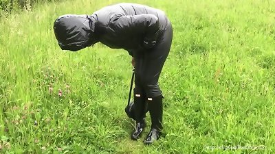 Wife in rubber boots and leather leggings (video recorded on phone)
