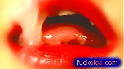 Intense zoom on semen in mouth and lips